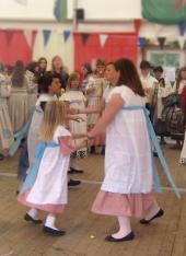 children in traditional english costumes